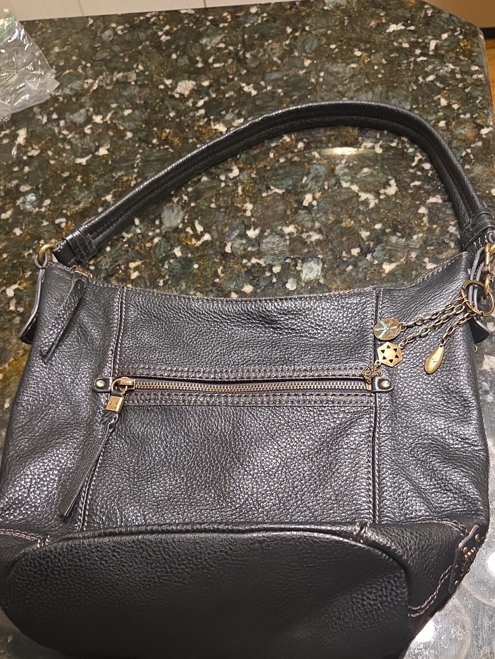 The Sak Black Pebbled Leather Shoulder Bag with Charm Accents